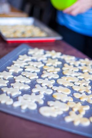 Christmas gingerbread men on a bakingの写真素材