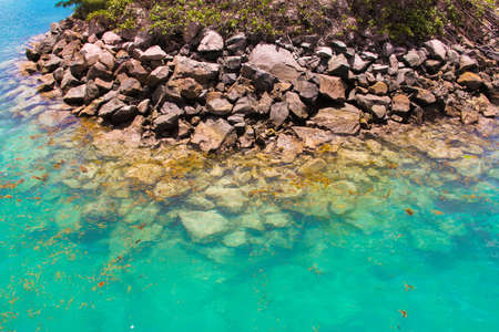 Turquoise exotic lagoon with big stones at Seychellesの写真素材