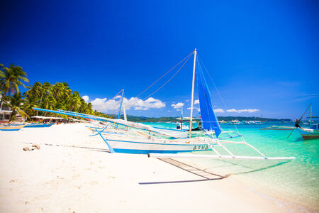 Boat at the beauty beach with turquoise water