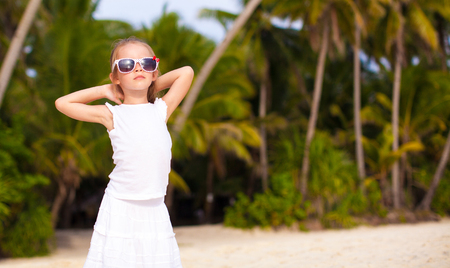 Adorable little girl on tropical beach vacation in Boracay, Phillipinesの写真素材