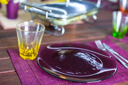Beautiful home served table on the verandaの写真素材
