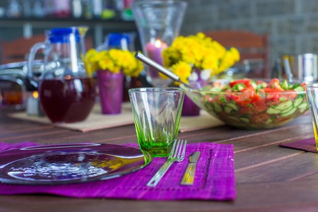 Beautiful home served table on the verandaの写真素材