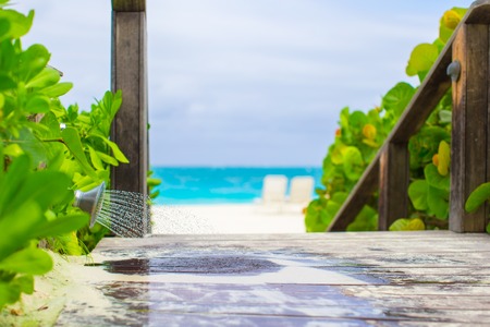 Close up tropical outdoor beach shower at exotic resortの写真素材