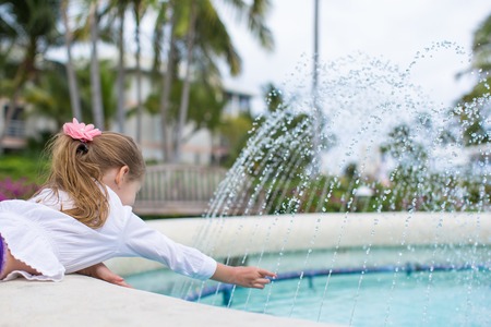 Little girl in a beautiful exotic hotelの写真素材