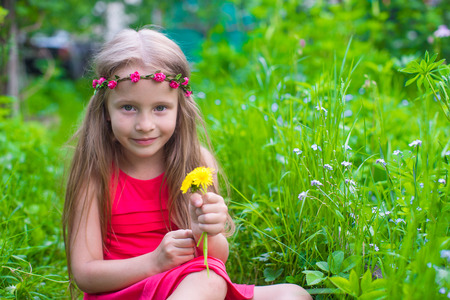 Portrait of adorable little girls on a warm summer dayの写真素材