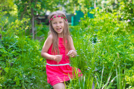 Portrait of adorable little girls on a warm summer dayの写真素材