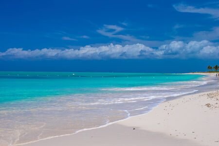 Perfect white beach with turquoise water at ideal islandの写真素材