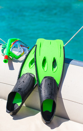Mask, snorkel and fins for snorkeling at boatの写真素材