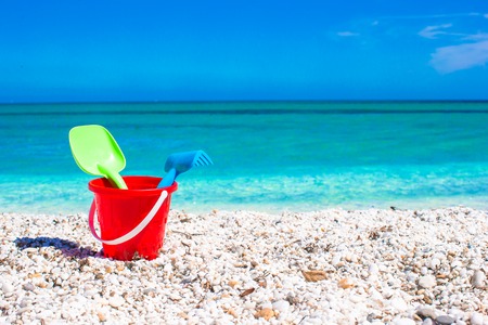 Summer kid's beach toy in the sandの写真素材