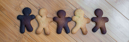 Sad burnt and ready colorful gingerbread cookiesの写真素材