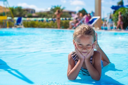 Little girl at aquapark during summer vacationの写真素材