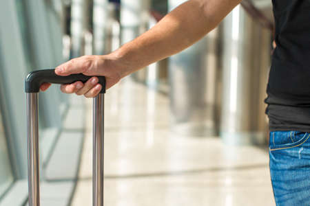 Closeup luggage in airport while waiting the flightの写真素材
