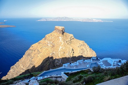 Skaros rock in Santorini against blue seaの写真素材