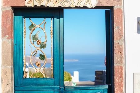 Typical blue door with stairs. Santorini island, Greeceの写真素材