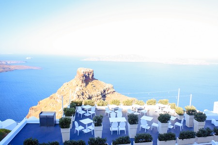 Skaros rock in Santorini against blue sea の写真素材