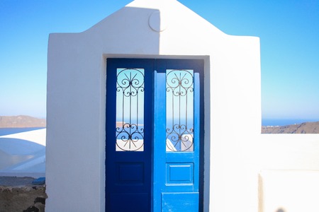 Typical blue door with stairs. Santorini island, Greeceの写真素材