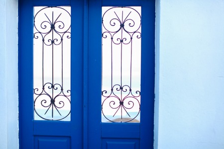 Typical blue door with stairs. Santorini island, Greeceの写真素材