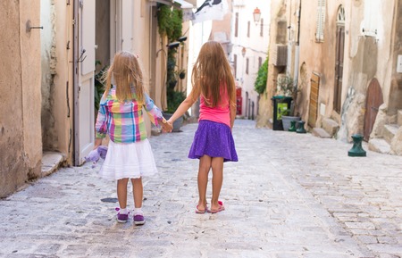 Adorable little girls outdoors in Bonifacio city,Corsicaの写真素材
