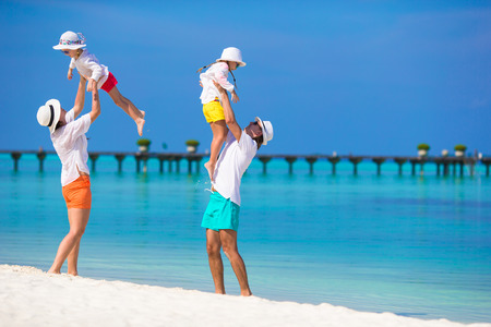 Happy family during beach vacationの写真素材