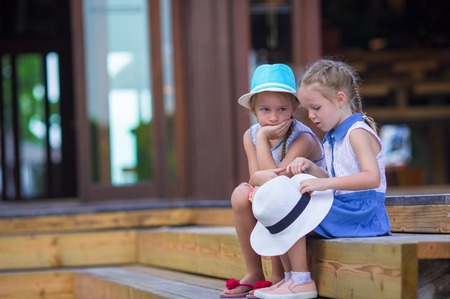 Adorable little girls during summer tropical vacationの写真素材