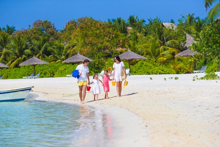 Young family on beach summer vacationの写真素材