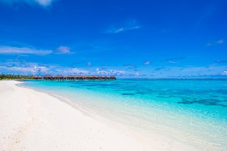 Water bungalows and wooden jetty on Maldivesの写真素材