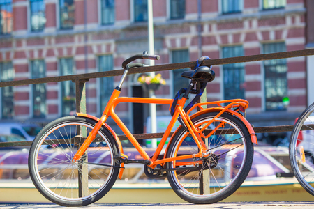Bicycle on the bridge in Amsterdam Netherlandsの写真素材