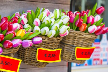 Sale of plastic Dutch tulips in the flower market at Amsterdamの写真素材