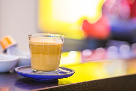 Cup of coffee on a wooden table