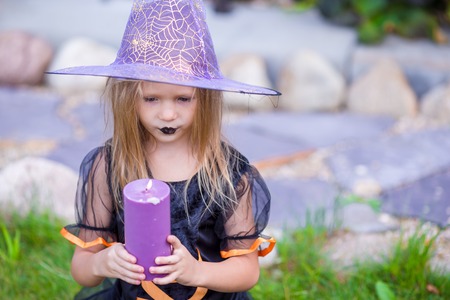 Happy girl in halloween costume with jack pumpkin.Trick or treatの写真素材