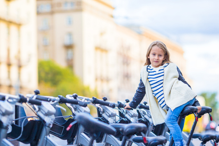 Adorable little girl outdoors in European cityの写真素材