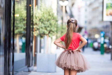Adorable little girl in Paris background the Eiffel tower in Franceの写真素材