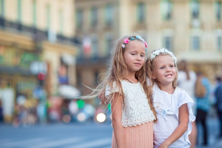 Adorable little girls outdoors in European cityの写真素材