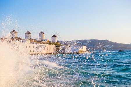 Old traditional windmills over the town of Mykonos.の写真素材