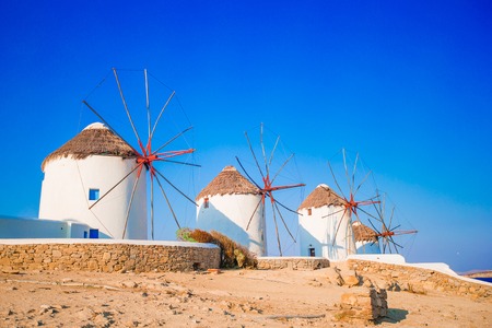 Old traditional windmills over the town of Mykonos.の写真素材