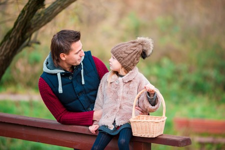 Happy family have fun on beautiful autumn dayの写真素材