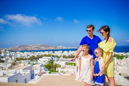 Family having fun outdoors on Mykonos islandの写真素材
