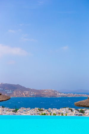 Edge of a pool on the cliff of Mykonos, Greeceの写真素材