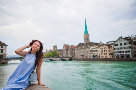 Beautiful woman enjoy vacation outdoors in Zurich, Switzerland.