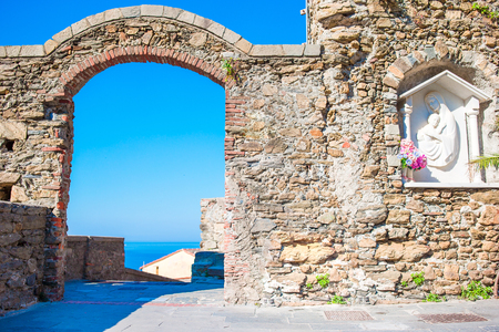 Old beautiful empty narrow streets in coastal village in Cinque Terre, Italyの写真素材