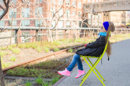 Adorable little girl enjoy sunny day on New Yorks High Lineの写真素材