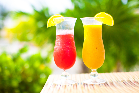 Close up fresh watermelon and mango cocktails on tropical resortの写真素材