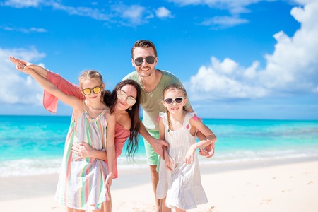 Young family on vacation have a lot of fun togetherの写真素材