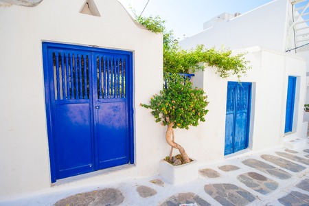Traditional houses in the narrow streets of Mykonos, Greece.の写真素材