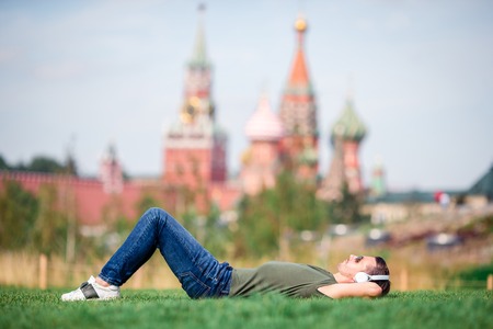 Happy young urban man enjoy his break in the cityの写真素材