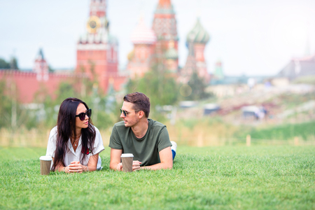 Young dating couple in love walking in city background St Basils Churchの写真素材
