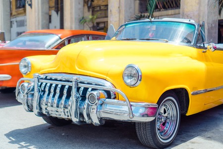 View of yellow classic vintage car in Old Havana, Cubaのeditorial素材