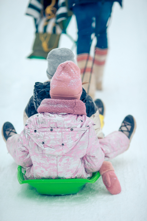 Family of dad and kids vacation on Christmas eve outdoors