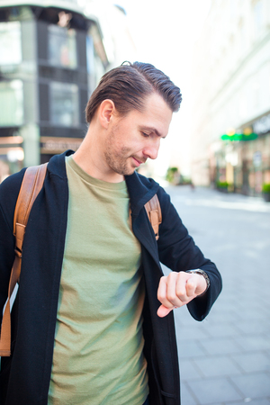 Young man background the old european city take selfieの写真素材