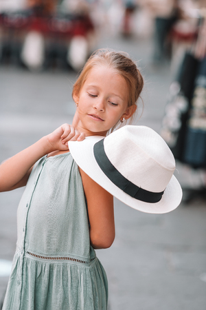 Adorable fashion little girl outdoors in European city Romeの写真素材